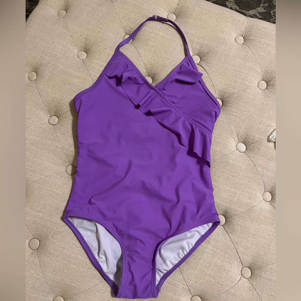 Purple one piece by SO. Size 12.